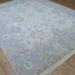 Blue Floral Hand-Knotted Oushak Wool Rug on Ivory Base - Image 2