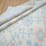 Blue Floral Hand-Knotted Oushak Wool Rug on Ivory Base - Image 4